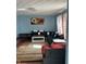 Stylish living room featuring a large sectional sofa, area rug, and natural light at 720 Mount Rainier Dr, Indianapolis, IN 46217