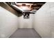 Unfinished basement featuring painted walls, concrete floor, and visible pipes at 7705 N State Road 42, Stilesville, IN 46180