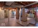 Unfinished basement ready for customization, featuring exposed ductwork and a sturdy foundation at 7705 N State Road 42, Stilesville, IN 46180