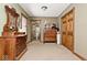 This bedroom has an ensuite bathroom and features built-in cabinets and neutral paint colors at 7705 N State Road 42, Stilesville, IN 46180