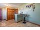 Cozy kitchenette with a breakfast bar, offering a relaxed and inviting space at 7705 N State Road 42, Stilesville, IN 46180