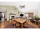 Open concept living and dining rooms with a fireplace, and vaulted ceilings at 7705 N State Road 42, Stilesville, IN 46180
