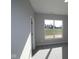 Bright bedroom offering a scenic view through a large window at 10502 Oak Bend Blvd, Indianapolis, IN 46239