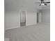 A spacious bedroom with soft carpeting, ceiling fan, and neutral walls at 10502 Oak Bend Blvd, Indianapolis, IN 46239