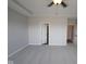 Spacious bedroom with tray ceiling and ceiling fan featuring plush carpeting and neutral walls at 10502 Oak Bend Blvd, Indianapolis, IN 46239