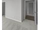 The bedroom features plush carpeting and access to another room with sleek wood flooring at 10502 Oak Bend Blvd, Indianapolis, IN 46239