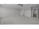 Large, airy bedroom with soft carpeting, ceiling fan, and neutral walls at 10502 Oak Bend Blvd, Indianapolis, IN 46239