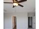 Bright bedroom features a ceiling fan, tray ceiling and access to an ensuite bathroom at 10502 Oak Bend Blvd, Indianapolis, IN 46239