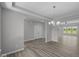 The dining room offers sleek floors and open access to the surrounding living spaces at 10502 Oak Bend Blvd, Indianapolis, IN 46239