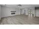 Spacious living room with cozy fireplace and hardwood floors at 10502 Oak Bend Blvd, Indianapolis, IN 46239