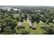 Neighborhood aerial view featuring tree-lined streets and well-maintained homes with spacious lawns at 1231 S Catherwood Ave, Indianapolis, IN 46203