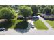 Aerial view of a suburban home with a lush green lawn and mature trees at 1231 S Catherwood Ave, Indianapolis, IN 46203
