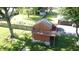 Aerial view of a shed with a second story deck and a red shed in the background at 1231 S Catherwood Ave, Indianapolis, IN 46203