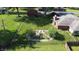 Aerial view of the fenced in backyard with a large garden and shed at 1231 S Catherwood Ave, Indianapolis, IN 46203