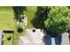 Aerial view of a well-maintained backyard featuring a custom water feature and mature trees at 1231 S Catherwood Ave, Indianapolis, IN 46203