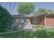 Inviting backyard patio and lush lawn, perfect for outdoor entertaining and relaxing at 1231 S Catherwood Ave, Indianapolis, IN 46203