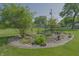Beautifully landscaped garden with rock features, offering a serene outdoor space at 1231 S Catherwood Ave, Indianapolis, IN 46203