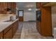 Spacious kitchen view into laundry area with modern appliances at 1231 S Catherwood Ave, Indianapolis, IN 46203