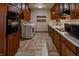 Well-equipped laundry room with ample cabinet space and modern appliances at 1231 S Catherwood Ave, Indianapolis, IN 46203