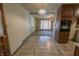 View from kitchen into the living room with natural light at 1231 S Catherwood Ave, Indianapolis, IN 46203