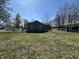 Large backyard offers plenty of space for outdoor activities and gardening at 1235 Indiana Ave, Anderson, IN 46012