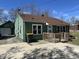 Well-kept single-Gathering home with a detached garage and tidy front yard at 1235 Indiana Ave, Anderson, IN 46012