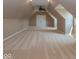 Large bonus room with vaulted ceilings, a ceiling fan, and ample natural light at 12484 E 156Th St, Noblesville, IN 46060