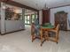 Inviting dining area with a decorative table and seating, adjacent to living space at 12484 E 156Th St, Noblesville, IN 46060
