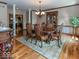 Formal dining room with elegant chandelier and classic wooden furniture at 12484 E 156Th St, Noblesville, IN 46060