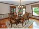Beautiful dining room with hardwood floors, elegant furniture, and plenty of natural light at 12484 E 156Th St, Noblesville, IN 46060