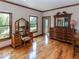 Dressing area with hardwood floors, a vanity, and natural light from multiple windows at 12484 E 156Th St, Noblesville, IN 46060