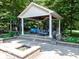 Beautifully landscaped gazebo with comfortable seating, perfect for outdoor relaxation and enjoyment at 12484 E 156Th St, Noblesville, IN 46060