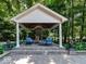 Charming outdoor gazebo with cozy seating and decorative accents, creating an inviting space at 12484 E 156Th St, Noblesville, IN 46060