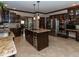 Kitchen with center island, wine cooler, stainless steel appliances, and granite countertops at 12484 E 156Th St, Noblesville, IN 46060