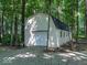 Outbuilding with a garage door surrounded by trees at 12484 E 156Th St, Noblesville, IN 46060