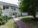 Wood walkway leading to the house with landscaped yard at 12484 E 156Th St, Noblesville, IN 46060
