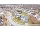 An aerial view shows a suburban neighborhood with tree-lined streets at 1501 Willshire Dr, Greenwood, IN 46143