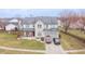 Detailed aerial shot of a beautiful home showcasing its manicured lawn and architectural features at 1501 Willshire Dr, Greenwood, IN 46143