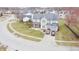 Beautifully landscaped home with well-manicured lawn and convenient two-car garage nestled in quiet residential neighborhood at 1501 Willshire Dr, Greenwood, IN 46143