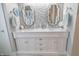 Stylish bathroom with double vanity, marble countertop, and decorative mosaic tile wall at 1501 Willshire Dr, Greenwood, IN 46143
