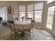 Bright breakfast nook with lots of natural light that includes a hardwood floors at 1501 Willshire Dr, Greenwood, IN 46143