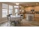 Bright kitchen with lots of natural light that includes a breakfast nook with table at 1501 Willshire Dr, Greenwood, IN 46143