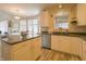 Open kitchen with modern appliances and ample counter space, ideal for cooking and entertaining at 1501 Willshire Dr, Greenwood, IN 46143