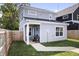 Charming backyard featuring a well-maintained lawn, patio area, and privacy fence at 1842 Milburn St, Indianapolis, IN 46202