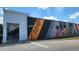Artisan Marketplace at 16 Tech exterior featuring unique murals and architectural design at 1842 Milburn St, Indianapolis, IN 46202
