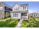 Charming two-story home features a well-maintained front yard, inviting entrance, and classic architectural details at 1842 Milburn St, Indianapolis, IN 46202