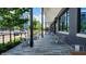 Outdoor patio seating area at 16 Tech with tables, chairs, and modern building backdrop at 1842 Milburn St, Indianapolis, IN 46202