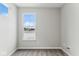 Neutral bedroom with gray carpet and a window providing view of the outdoors at 20238 Allegheny Ln, Westfield, IN 46074