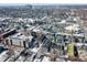 Aerial view highlights modern townhomes with access to city amenities and developing urban landscapes at 2115 Coretta Way, Indianapolis, IN 46202