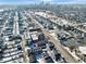 Panoramic aerial showing a city neighborhood with modern housing developments against a distant skyline at 2115 Coretta Way, Indianapolis, IN 46202